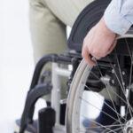 hand-wheelchair-wheel-close-up